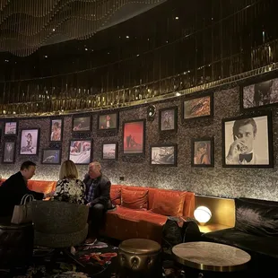 a group of people sitting in a lounge area