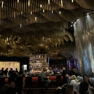 people sitting at the bar