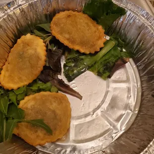 Sad looking mixed greens should never be served with hot fried food.