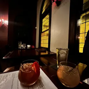 Cocktails - Mistakes Were Made (red) and Forbidden Fruit (orange)