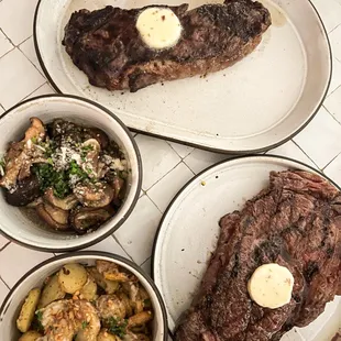 three plates of food on a table