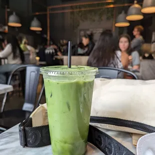 a green smoothie in a cafe