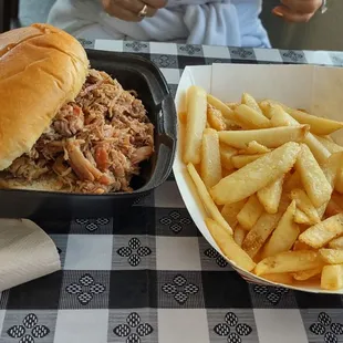 Pulled pork sandwich and fries