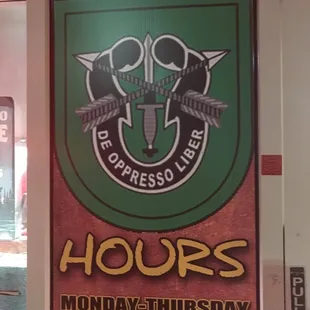 a sign for hours