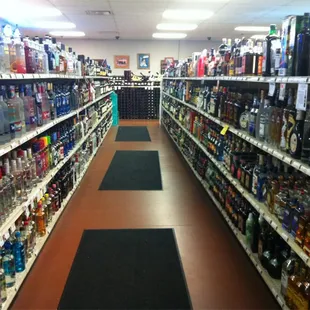 the aisle of a liquor store