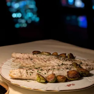 Salted Baked Branzino ($100) - 4 stars. Soft w wonderful flavors. Brussel sprouts a little soggy, esp for the price. Wed dinner 2024-11-27