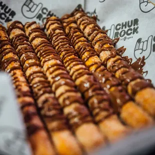 a close up of a box of doughnuts