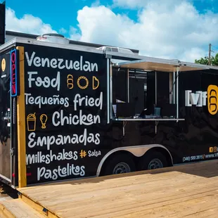 a food truck parked in front of a building