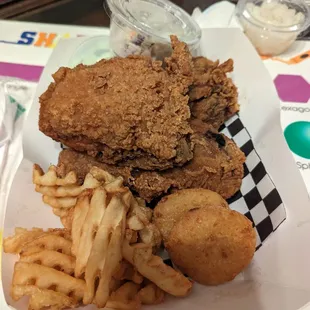 Three piece combo... Venezuelans style Fried Chicken with fries, Cheesy Arepitas , dipping sauce and coleslaw