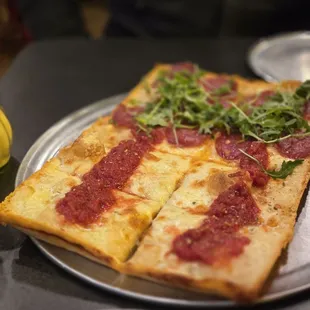 Classic Cheese and rocket half and half pizza