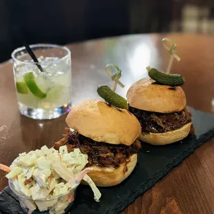 $8.99 (2) Pork Sliders comes with slaw inside and small shot of slaw. But I asked for dairy on the side instead.