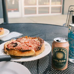 Meaty Whole Pizza w/ non-alcoholic beer