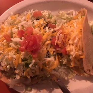 Toastada with ground beef and chicken taco