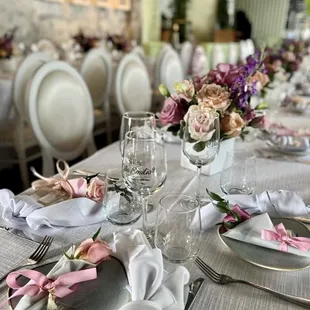 a table set for a wedding reception