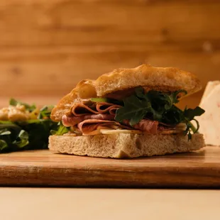 a sandwich on a cutting board