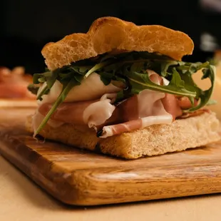 a sandwich on a cutting board