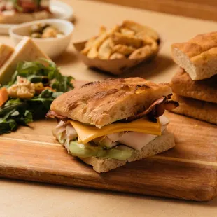 a sandwich on a cutting board