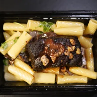 Braised Short Ribs - toasted walnuts - shiitake mushrooms - gorgonzola cream sauce
