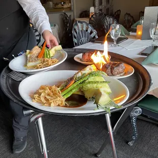 Signature Red Oak Smoked Tenderloin and Chilean Sea Bass.