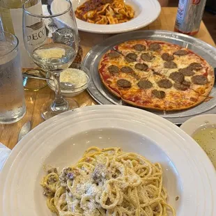 Carbonara, sausage pizza