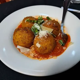 4 Arancini per order. Made out of pesto risotto.