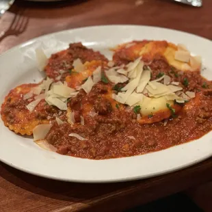 Home made cheese ravioli with a marinara meat sauce