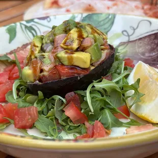 an avocado and tomato salad