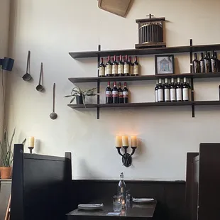 a table and shelves in a restaurant