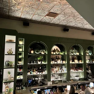 people sitting at a bar