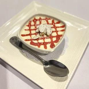  white plate with a dessert on it