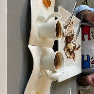 two cups of coffee and ice cream