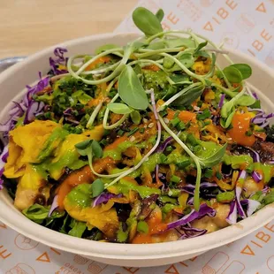 Bombay Bowl - Light in curry flavor, little ginger, tahini sauce, fresh veggies, chickpeas, quinoa. Add house sauce for heat.