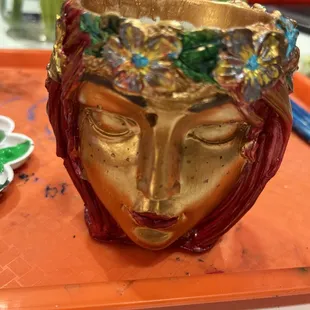 So creative and really tapped in and added freckles to reflect a mirror image of herself!