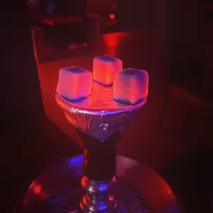 a glass with marshmallows in it