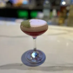 Ho ho ho holiday drink. Egg white, rosemary, cran juice. La pinta, limoncello, lemon juice.