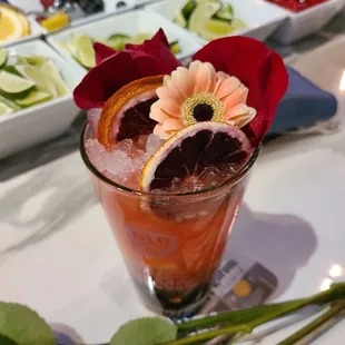 a drink with a flower on top