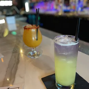 two cocktails on the bar