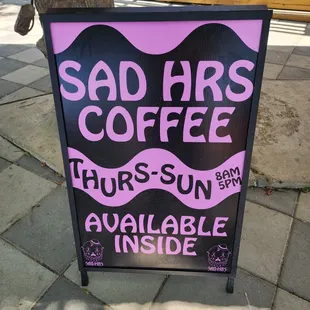 a sign for a coffee shop