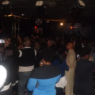 a large group of people dancing