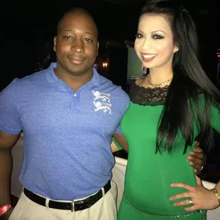 a man and a woman posing for a picture