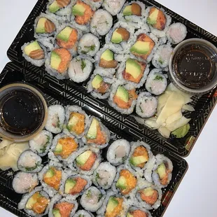 two trays of sushi