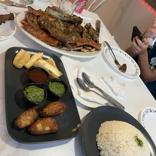 Grand VICA signature combo. 4 ppl Calamares Fritos Ceviche Mixto Fried Yuca White Rice
