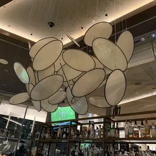a chandelier made of pans