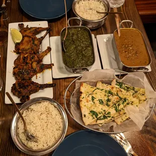 Lamb Lollipops ($27). Sarson Ka Saag ($18). Smoked Daal Bukhara ($18). Garlic Naan ($5). See my close-ups for what&apos;s in the first 3 dishes.