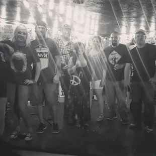 a black and white photo of a group of people