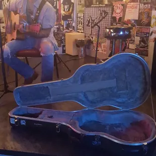 a man playing guitar