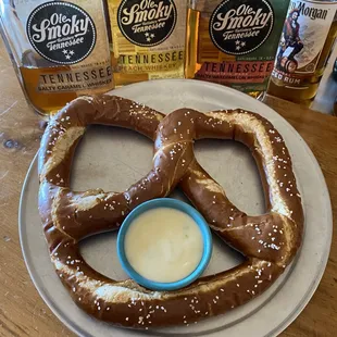 a pretzel and a bottle of whiskey