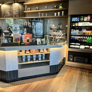 a counter with a variety of drinks