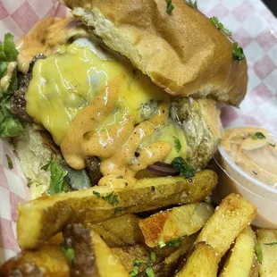 a cheeseburger and fries