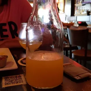 a pitcher of orange juice